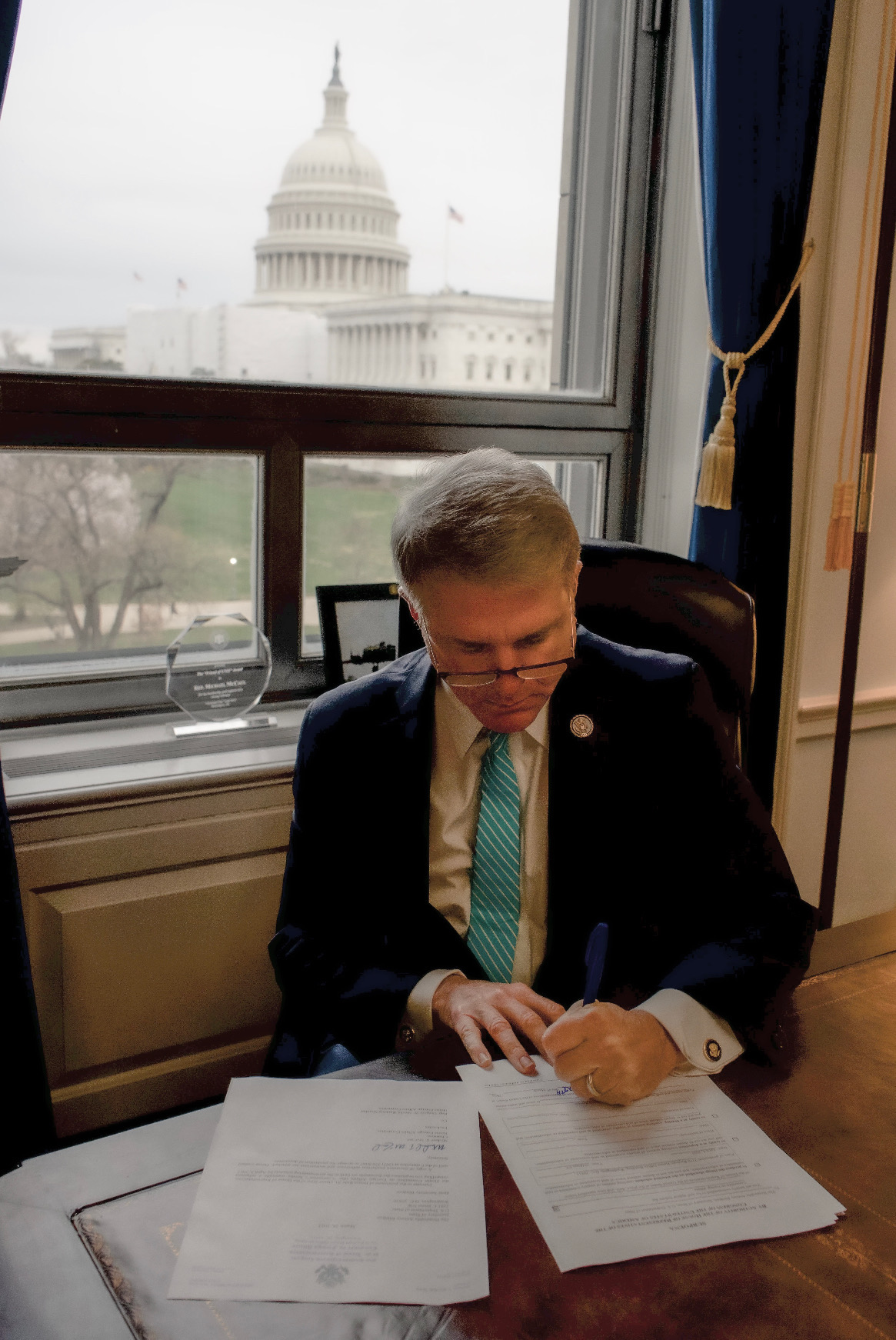 McCaul signing the subpoena 